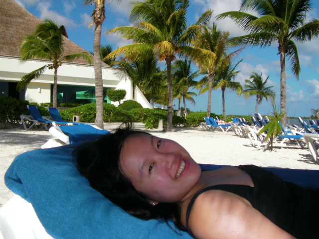 Beach Lounging Suntanning Shade Palapa Blue Bay Grand Esmeralda All Inclusive Playa Del Carmen Riviera Maya Mexico Vacation Vera enjoying the shade of a little palapa