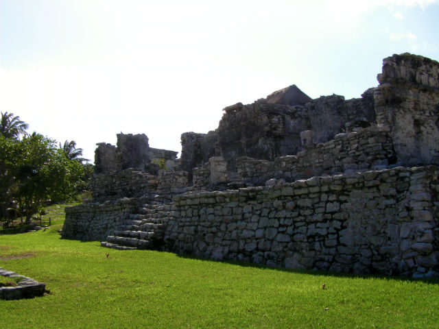 Tulum Ruins Riviera Maya Mexico Vacation Beautiful Paradise Many Mayan ruins in the area are still covered with vegetation, but these are uncovered for us to see