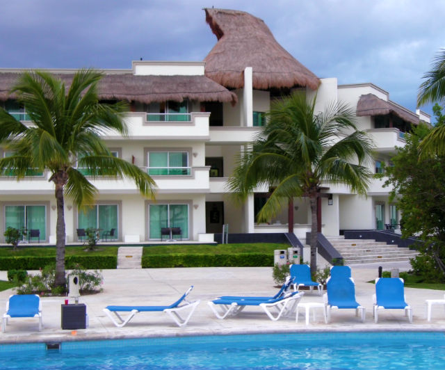 Blue Bay Grand Esmeralda All Inclusive Poolside Accommodations Playa Del Carmen Riviera Maya Mexico Vacation Paradise Poolside accommodations. We actually stayed in a different building nearby. But they all look alike.