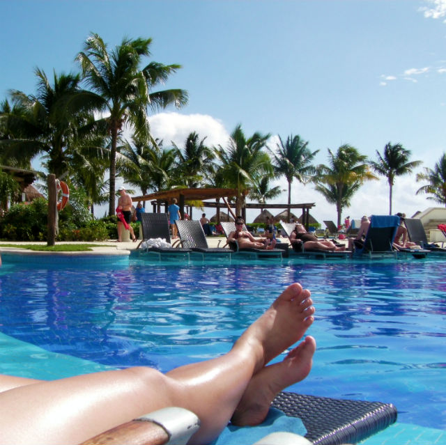 Blue Bay Grand Esmeralda All Inclusive Pool Playa Del Carmen Riviera Maya Mexico Vacation Vera getting some sun